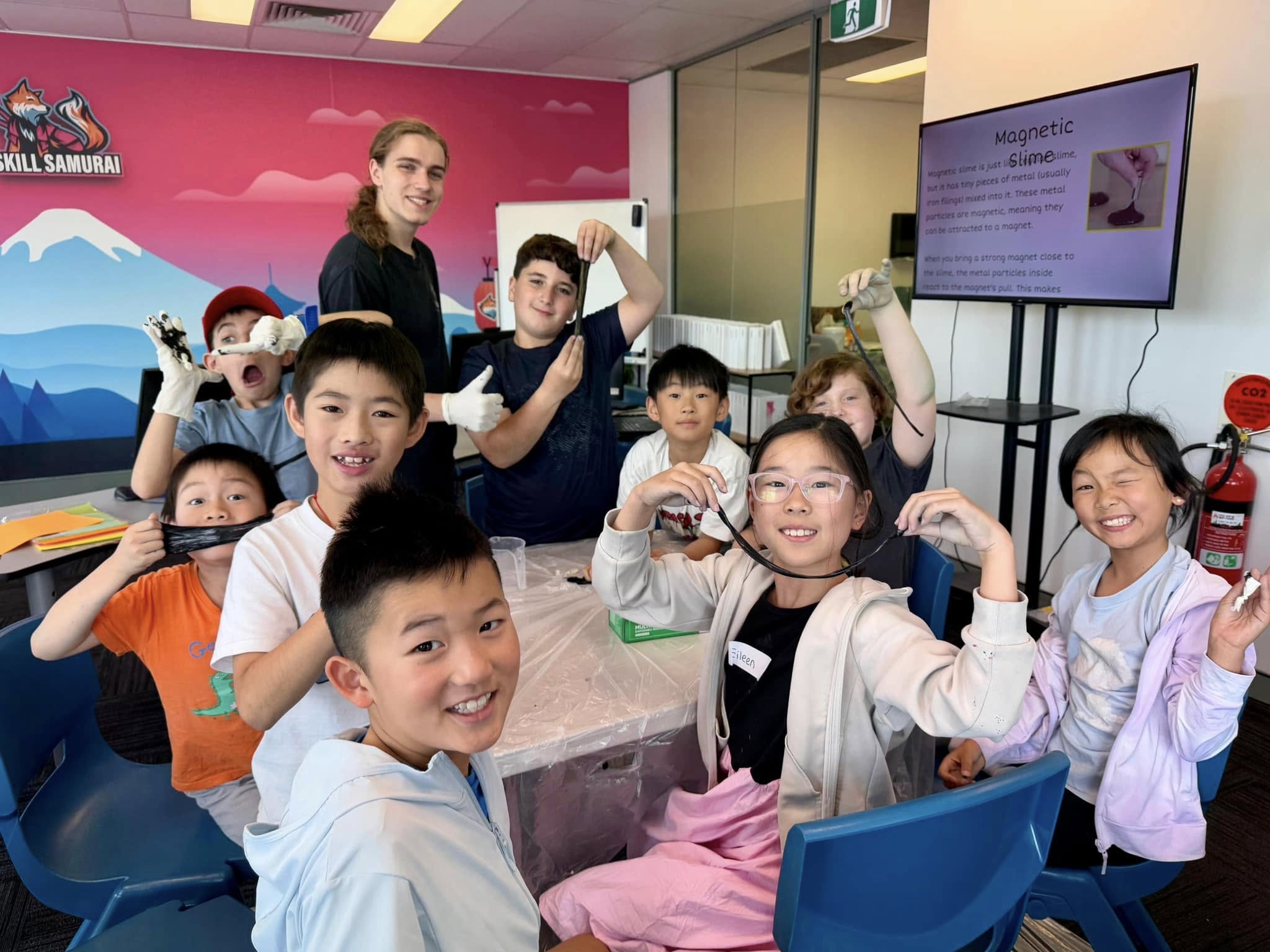TongXin Chinese School students participating in a hands-on STEM classroom activity